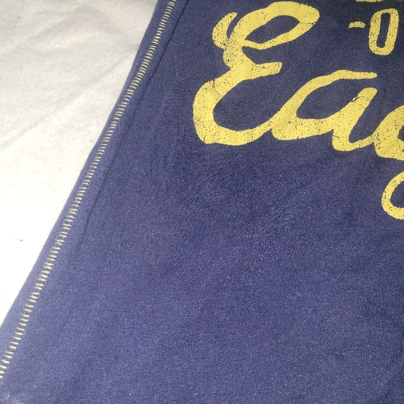 American eagle T-shirt size xs in navy blue with yellow lettering. - Picture 8 of 8